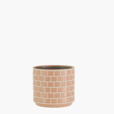 Pink flowerpot with wall effect design. on white background