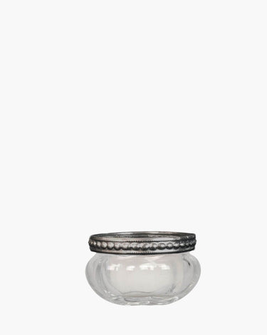 Glass tealight holder with pearl silver top on white background